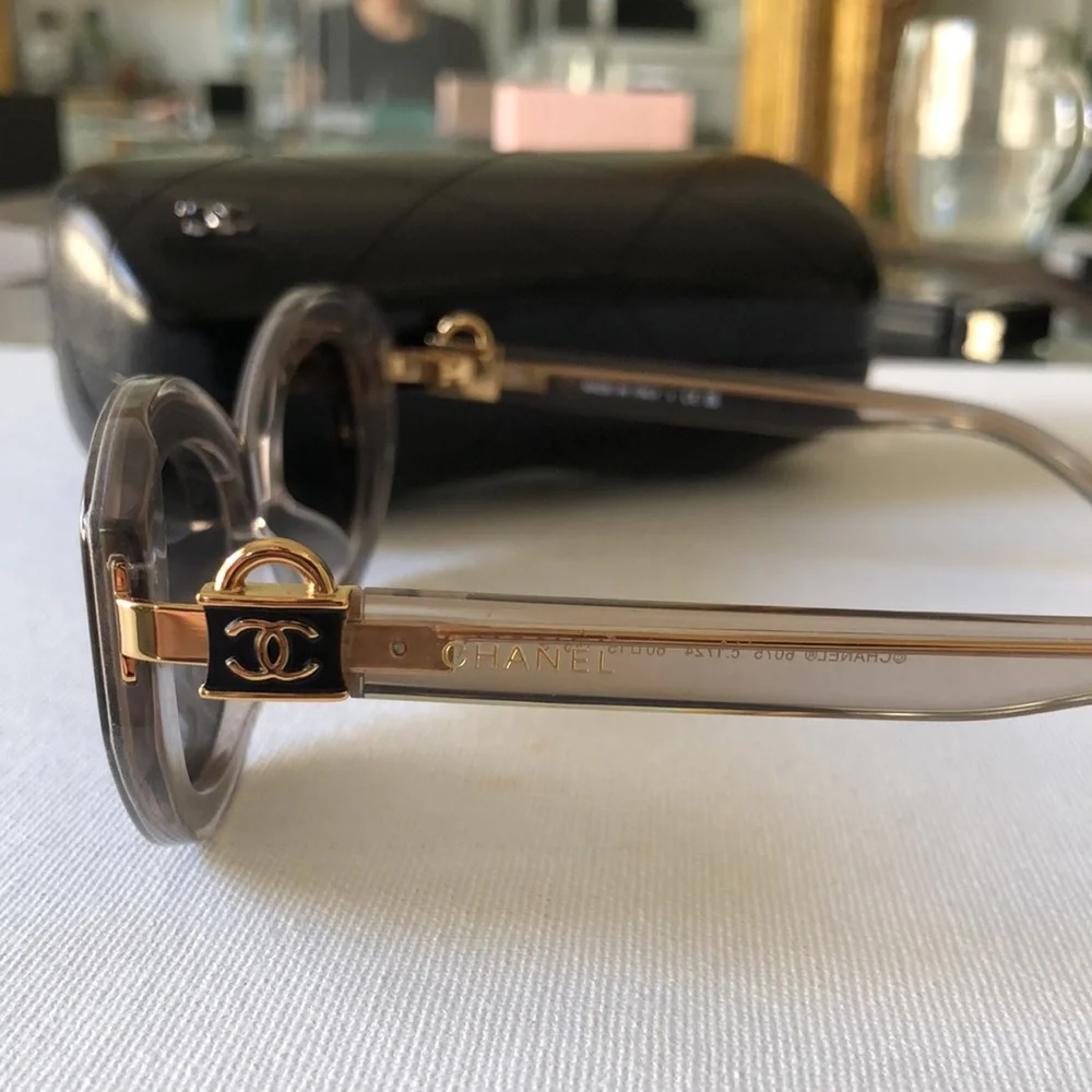 Chanel Gray Oval Sunglasses with CC lock on handles & Quilted Case